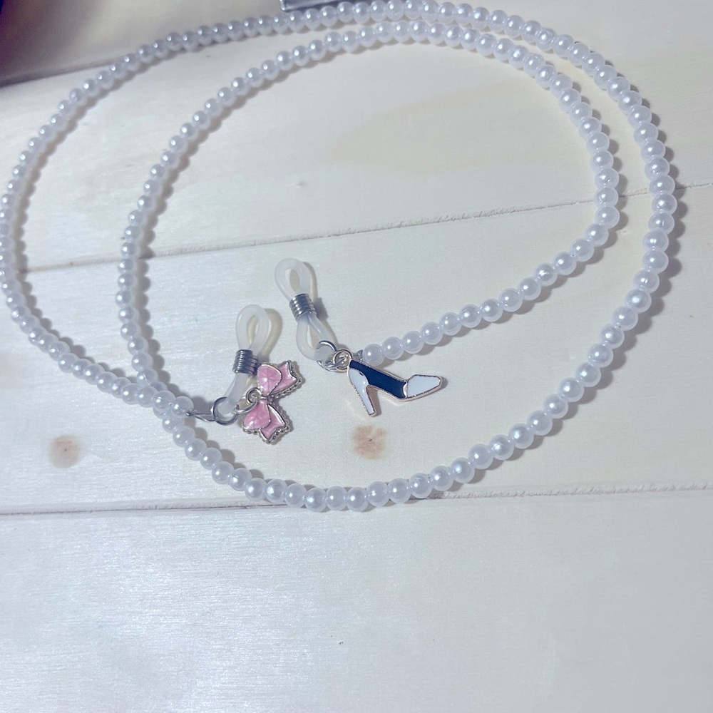 Cute white pearl eyeglass chain with shoe and pink bow charms